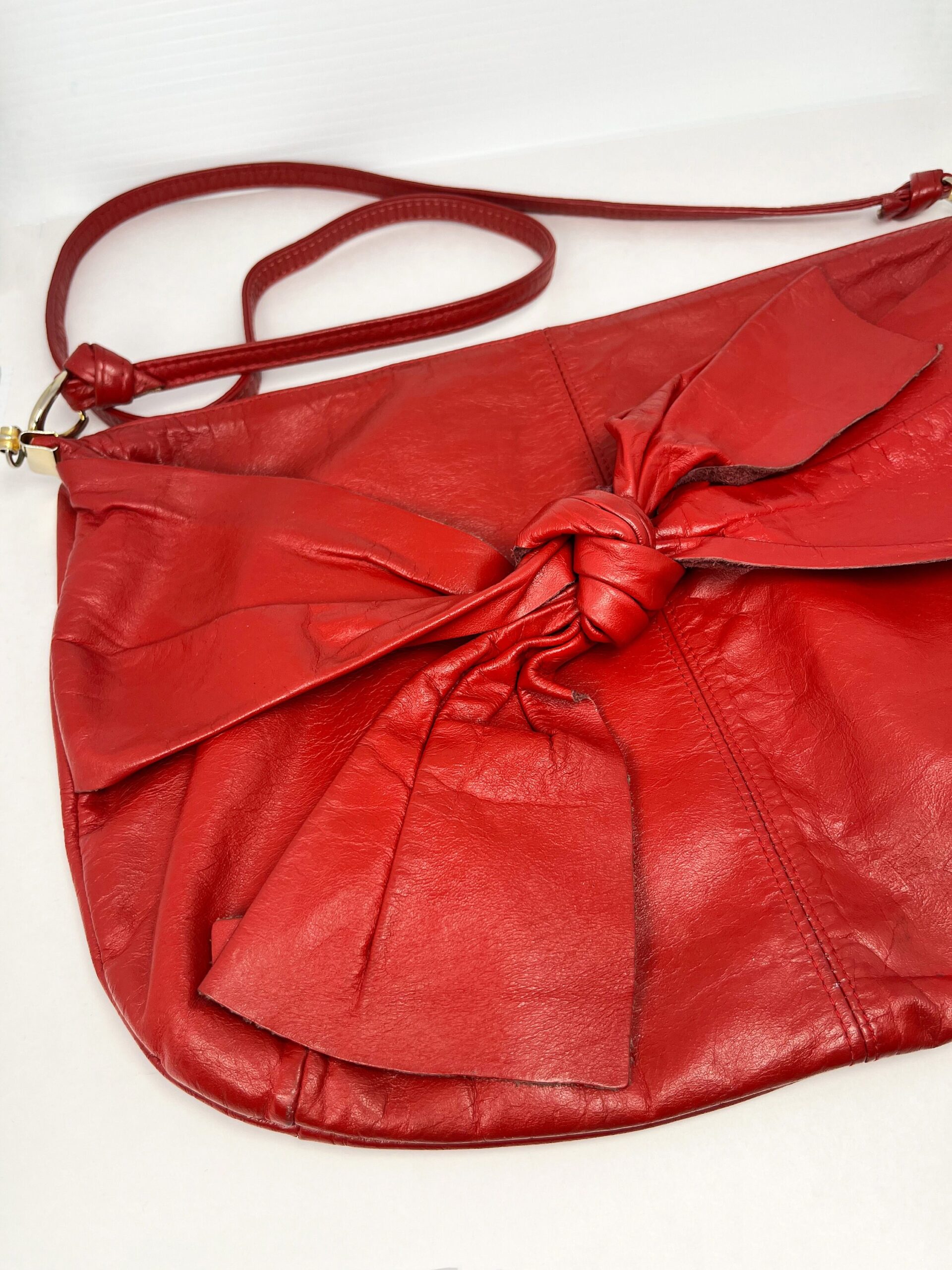 Vintage red leather 80s style purse with bow tie