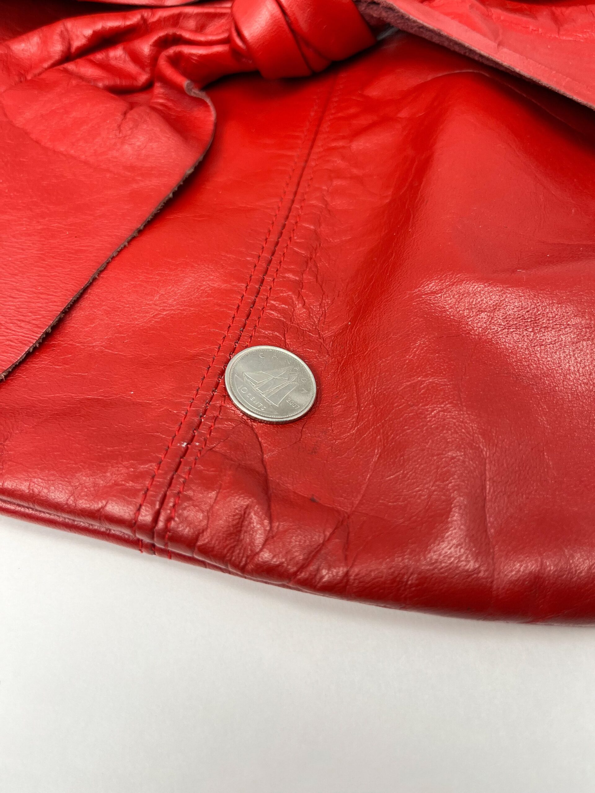 Vintage red leather 80s style purse with bow tie