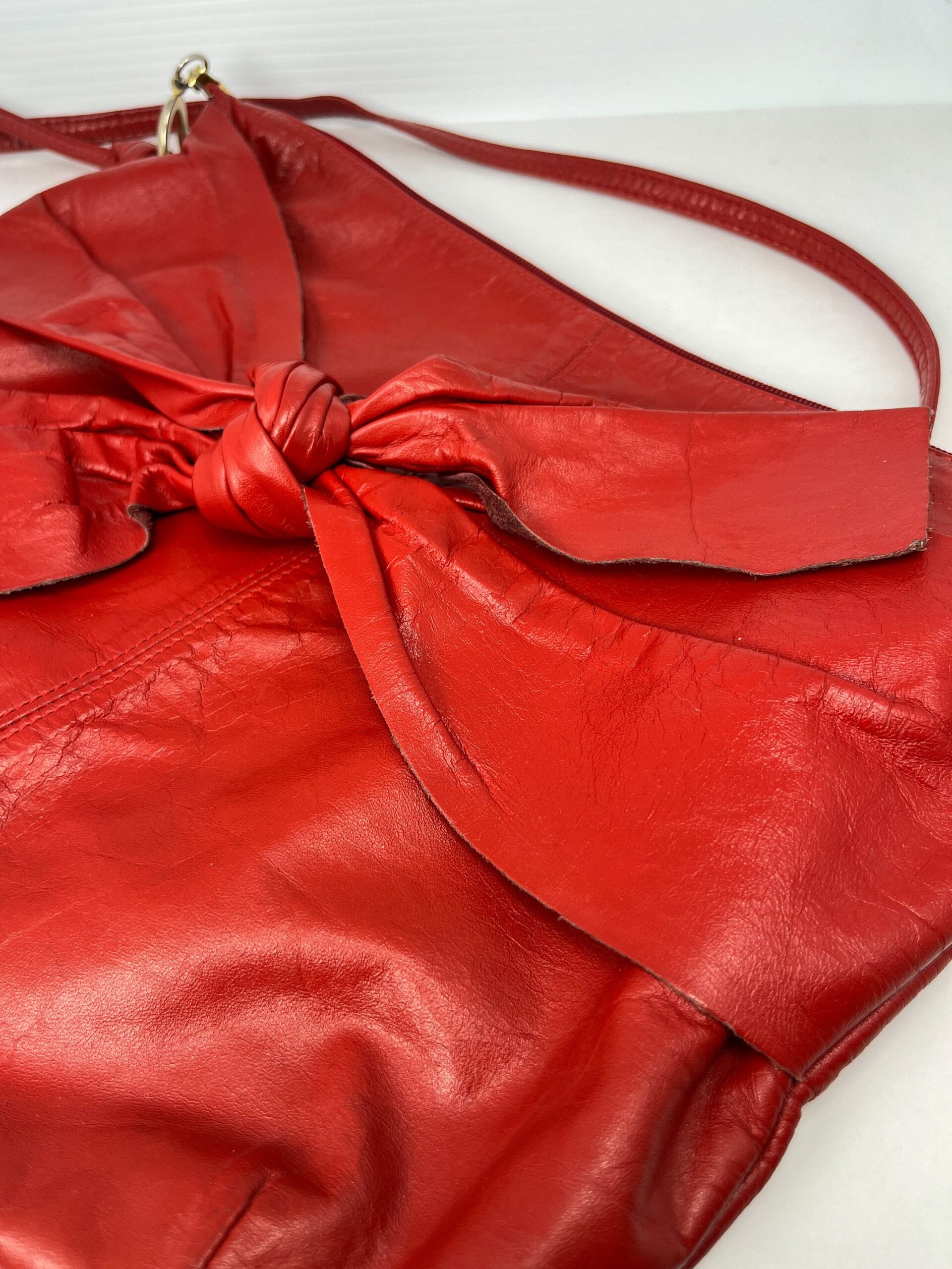 Vintage red leather 80s style purse with bow tie