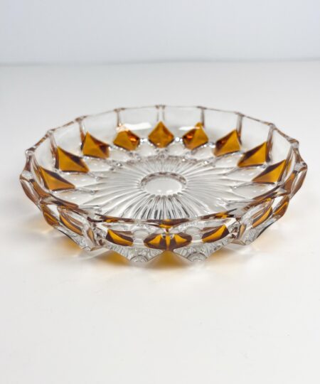 Vintage faceted crystal ashtray with amber coloured diamond motif
