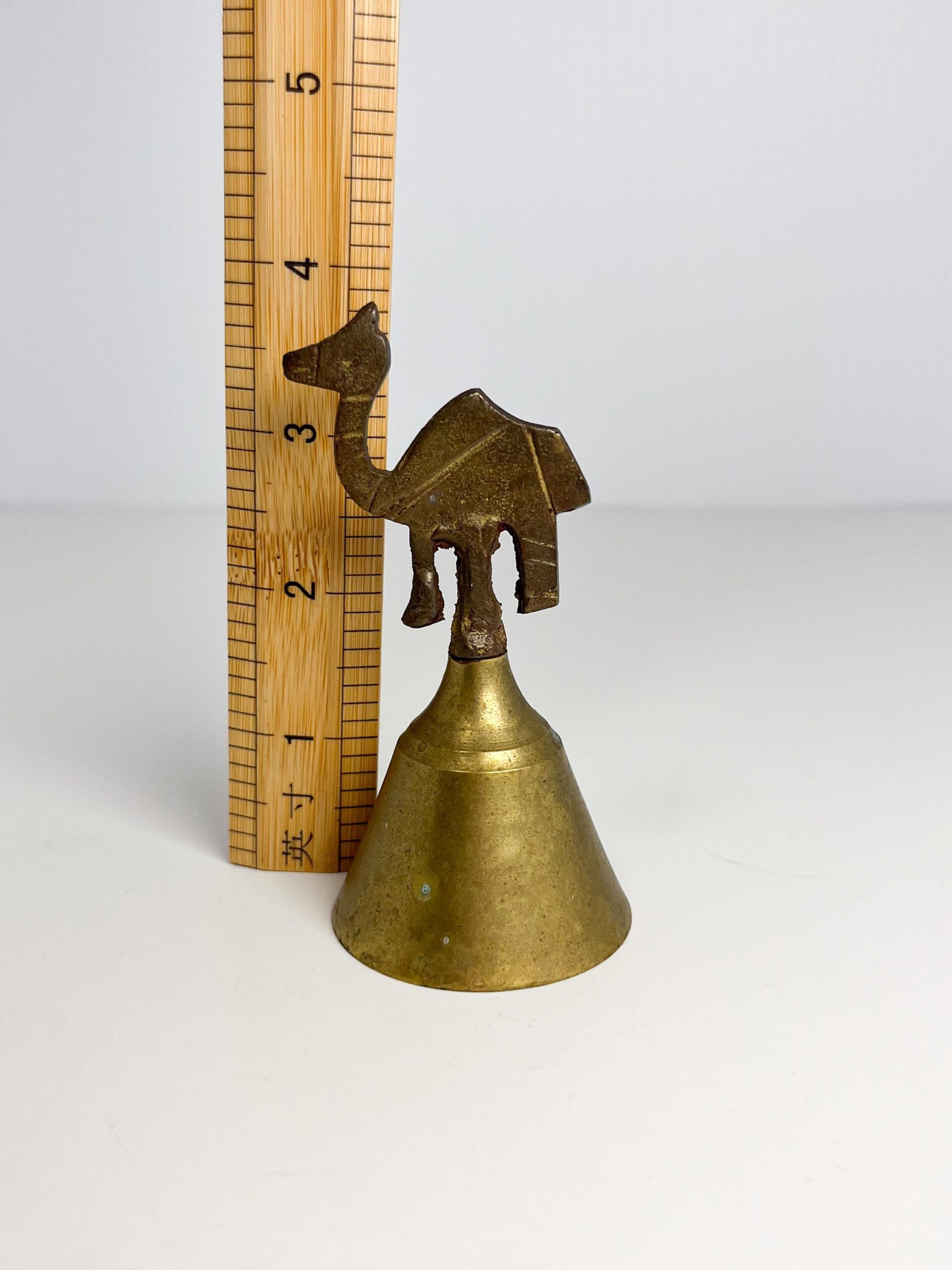 Vintage small brass camel bell - patina, rustic charm