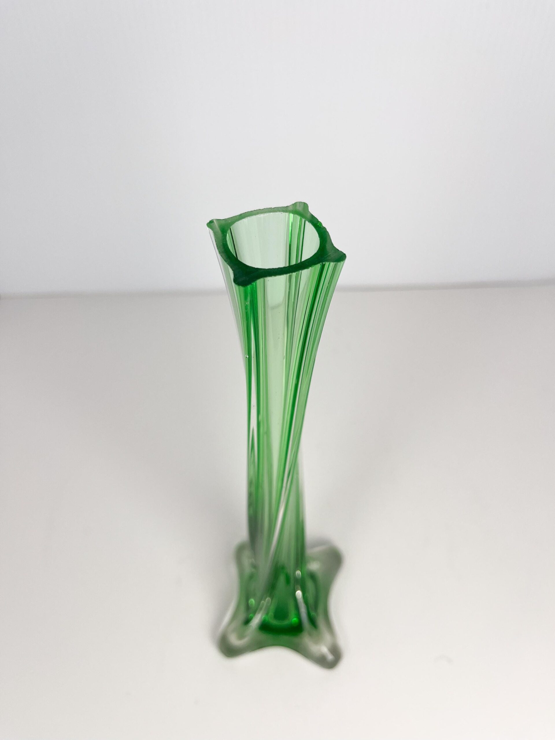 Vintage MCM emerald green art glass bud vase - twisted glass, footed